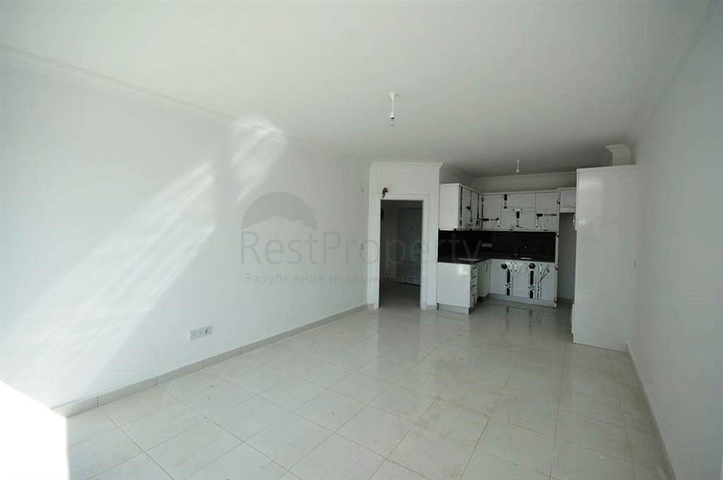 شقة بتخطيط 1+1 ضمن مجمع سكني حديث في منطقة ماحمود لار – ألانيا