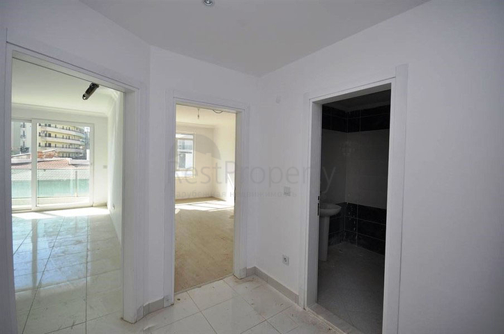 شقة بتخطيط 1+1 ضمن مجمع سكني حديث في منطقة ماحمود لار – ألانيا