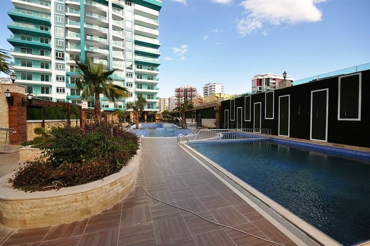 شقة بتخطيط 1+1 ضمن مجمع سكني حديث في منطقة ماحمود لار – ألانيا