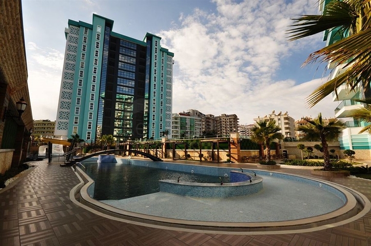 شقة بتخطيط 1+1 ضمن مجمع سكني حديث في منطقة ماحمود لار – ألانيا