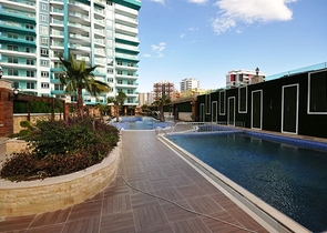 شقة بتخطيط 1+1 ضمن مجمع سكني حديث في منطقة ماحمود لار – ألانيا