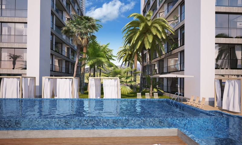 شقق ضمن مجمع جميل على شاطئ البحر قيد الإنشاء شمال مدينة قبرص التركية 