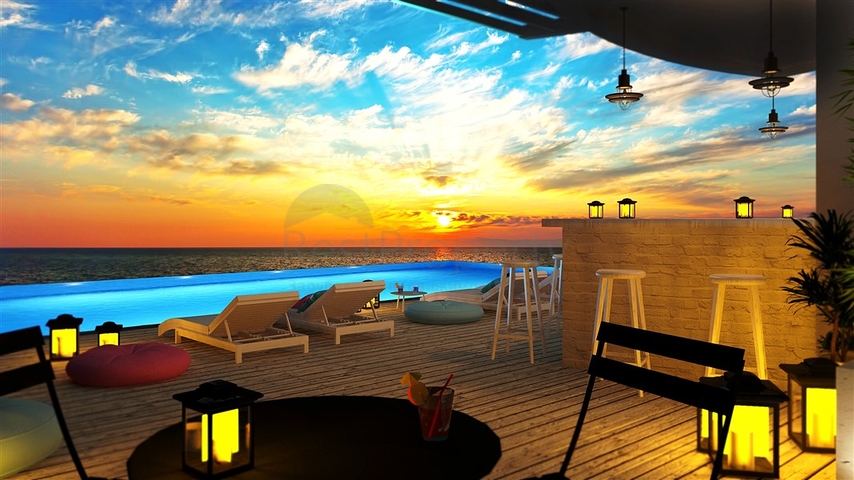 شقق ضمن مجمع جميل على شاطئ البحر قيد الإنشاء شمال مدينة قبرص التركية 