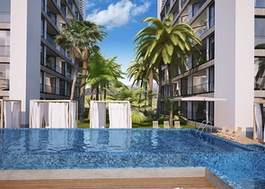 شقق ضمن مجمع جميل على شاطئ البحر قيد الإنشاء شمال مدينة قبرص التركية 