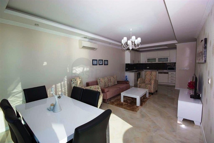 شقة سكنية بإطلالة بحرية رائعة ضمن مجمع عصري في منطقة أوبا – ألانيا