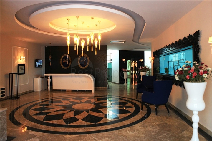 شقة سكنية بإطلالة بحرية رائعة ضمن مجمع عصري في منطقة أوبا – ألانيا