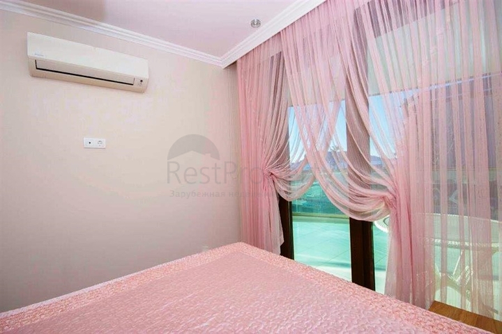 شقة سكنية بإطلالة بحرية رائعة ضمن مجمع عصري في منطقة أوبا – ألانيا