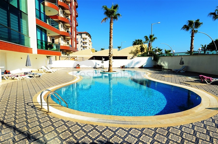 شقة سكنية بإطلالة بحرية رائعة ضمن مجمع عصري في منطقة أوبا – ألانيا