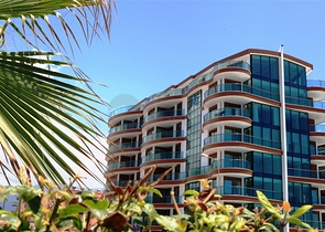 شقة سكنية بإطلالة بحرية رائعة ضمن مجمع عصري في منطقة أوبا – ألانيا