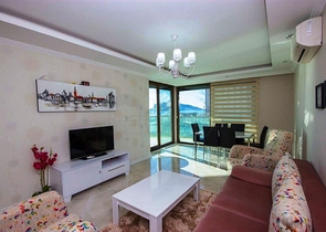 شقة سكنية بإطلالة بحرية رائعة ضمن مجمع عصري في منطقة أوبا – ألانيا