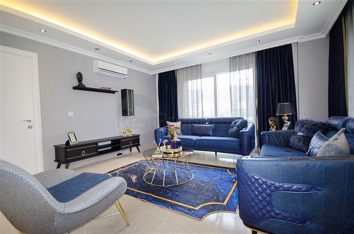 شقة بغرفة نوم وصالة ضمن مجمع مريح في منطقة محمودلار- ألانيا.