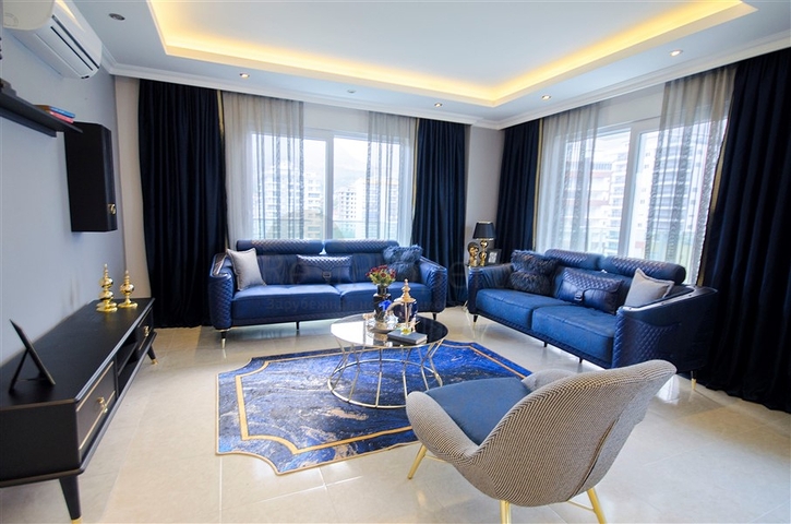 شقة بغرفة نوم وصالة ضمن مجمع مريح في منطقة محمودلار- ألانيا.