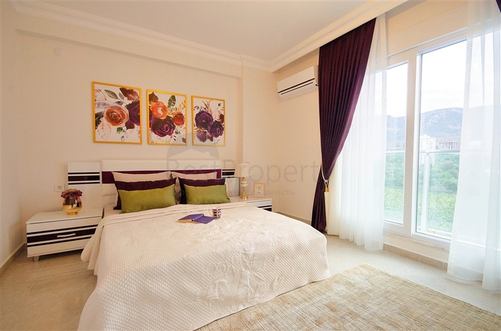 شقة بغرفة نوم وصالة ضمن مجمع مريح في منطقة محمودلار- ألانيا.