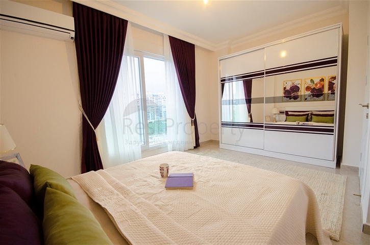 شقة بغرفة نوم وصالة ضمن مجمع مريح في منطقة محمودلار- ألانيا.