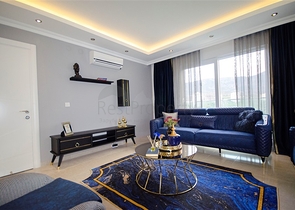 شقة بغرفة نوم وصالة ضمن مجمع مريح في منطقة محمودلار- ألانيا.