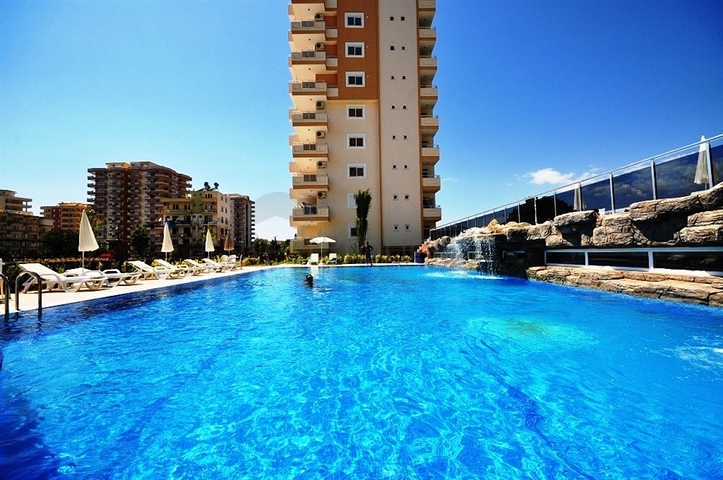 شقة واسعة ضمن مجمع سكني في منطقة ماهموت لار – ألانيا .