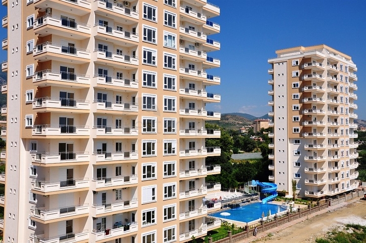 شقة واسعة ضمن مجمع سكني في منطقة ماهموت لار – ألانيا .