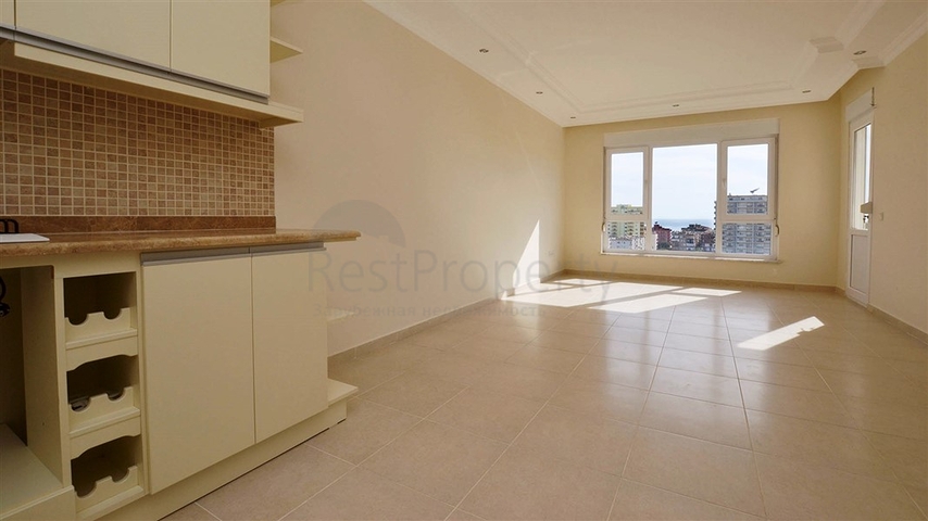 شقة واسعة ضمن مجمع سكني في منطقة ماهموت لار – ألانيا .