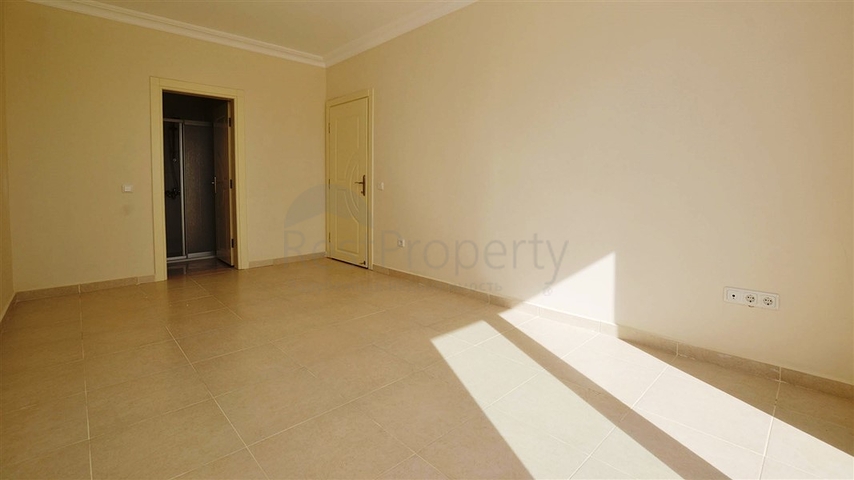 شقة واسعة ضمن مجمع سكني في منطقة ماهموت لار – ألانيا .