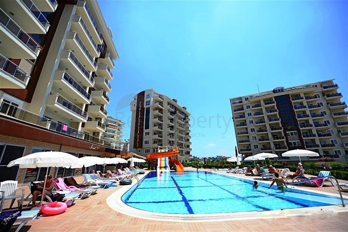 شقة ضمن مجمع فاخر في منطقة أفسلار – ألانيا 