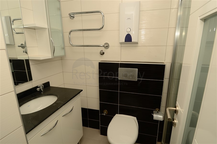 شقة ضمن مجمع سكني رائع في منطقة أفسلار – ألانيا .