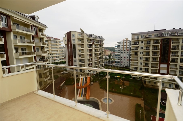 شقة ضمن مجمع سكني رائع في منطقة أفسلار – ألانيا .