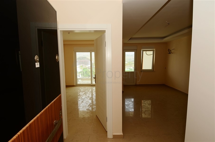 شقة بإطلالة جبلية مذهلة في منطقة ماهموت لار – ألانيا.