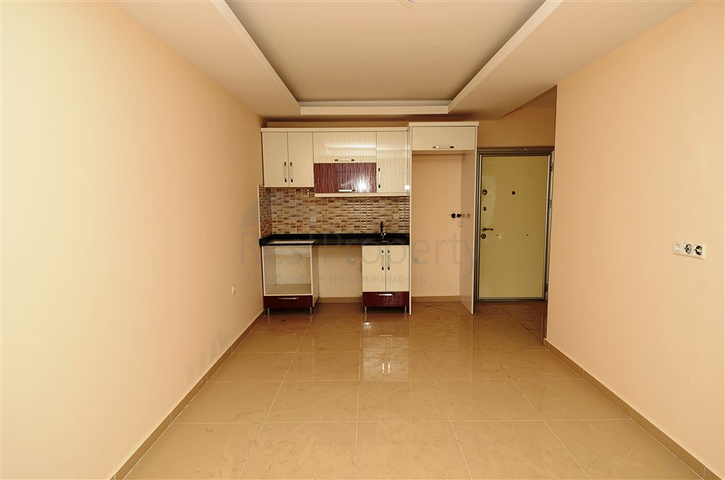 شقة بإطلالة جبلية مذهلة في منطقة ماهموت لار – ألانيا.