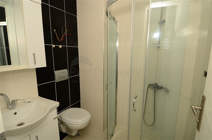 شقة بإطلالة جبلية مذهلة في منطقة ماهموت لار – ألانيا.