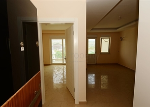 شقة بإطلالة جبلية مذهلة في منطقة ماهموت لار – ألانيا.