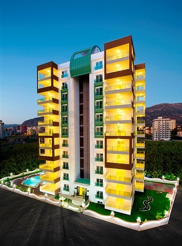 شقة بإطلالة جبلية ضمن مجمع حديث في منطقة محمود لار – ألانيا 