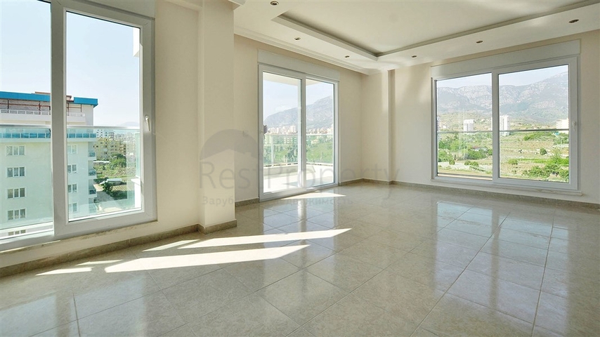 شقة بإطلالة جبلية ضمن مجمع حديث في منطقة محمود لار – ألانيا 