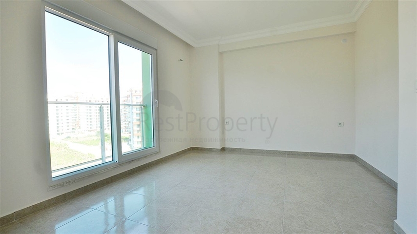 شقة بإطلالة جبلية ضمن مجمع حديث في منطقة محمود لار – ألانيا 