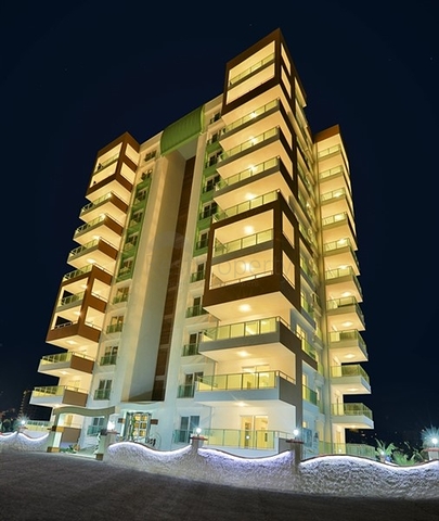 شقة بإطلالة جبلية ضمن مجمع حديث في منطقة محمود لار – ألانيا 