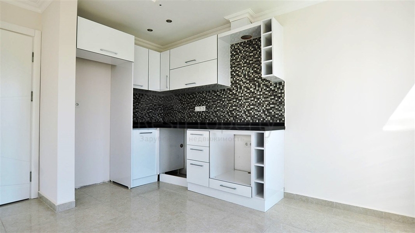 شقة بإطلالة جبلية ضمن مجمع حديث في منطقة محمود لار – ألانيا 