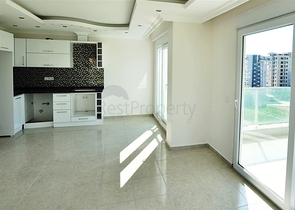 شقة بإطلالة جبلية ضمن مجمع حديث في منطقة محمود لار – ألانيا 