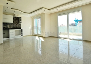 شقة بإطلالة جبلية ضمن مجمع حديث في منطقة محمود لار – ألانيا 