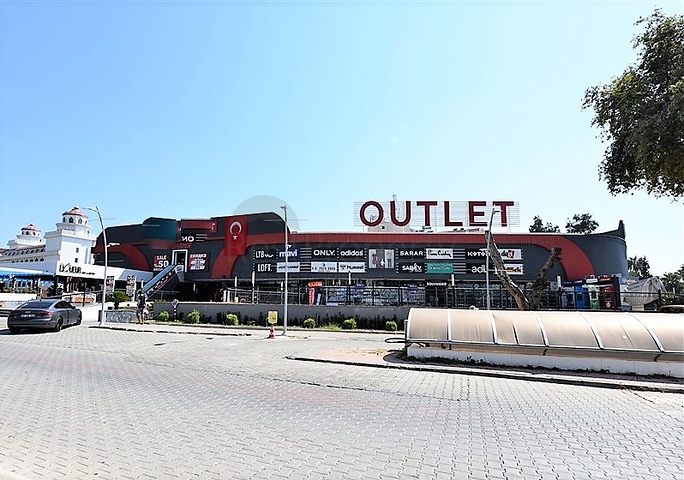 محلات ومباني تجارية ضمن مركز تسوق جديد قيد الإنشاء بالقرب من منطقة كوناكليه – ألانيا 