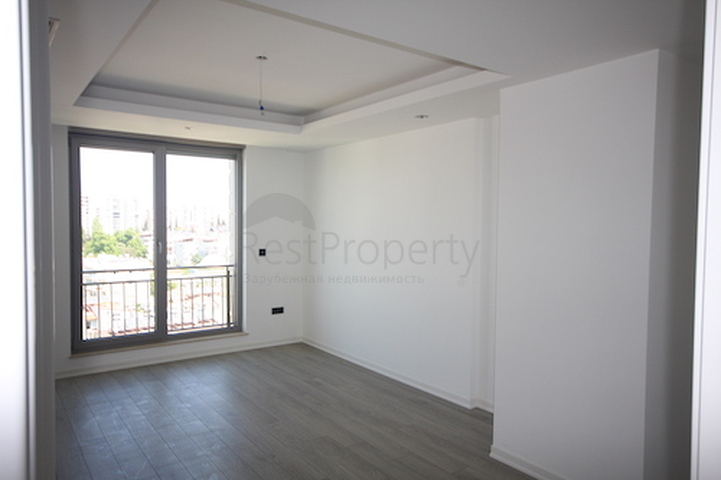 شقة فاخرة بإطلالة بانورامية على البحر في منطقة لارا – أنطاليا