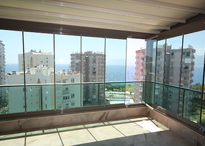 شقة فاخرة بإطلالة بانورامية على البحر في منطقة لارا – أنطاليا