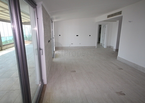 شقة فاخرة بإطلالة بانورامية على البحر في منطقة لارا – أنطاليا