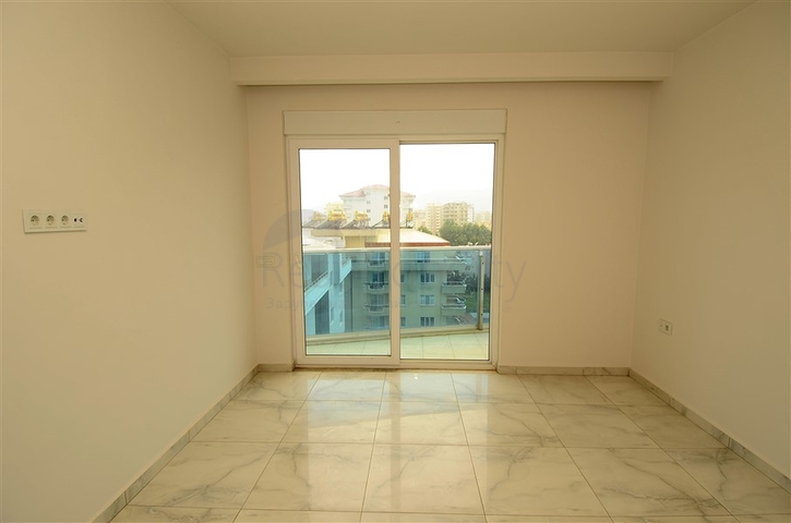 شقة بإطلالة بحرية مميزة في منطقة محمود لار – ألانيا