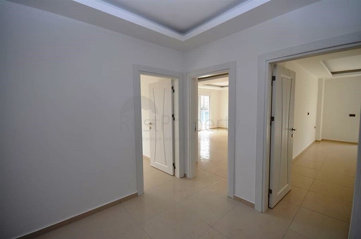 شقة ضمن مجمع سكني حديث في منطقة محمود لار – ألانيا