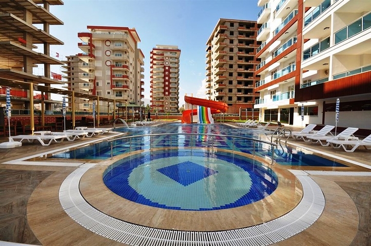 شقة ضمن مجمع سكني حديث في منطقة محمود لار – ألانيا