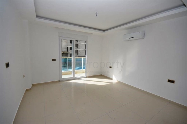 شقة ضمن مجمع سكني حديث في منطقة محمود لار – ألانيا