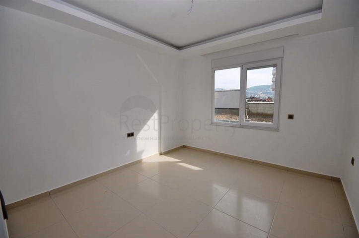 شقة ضمن مجمع سكني حديث في منطقة محمود لار – ألانيا