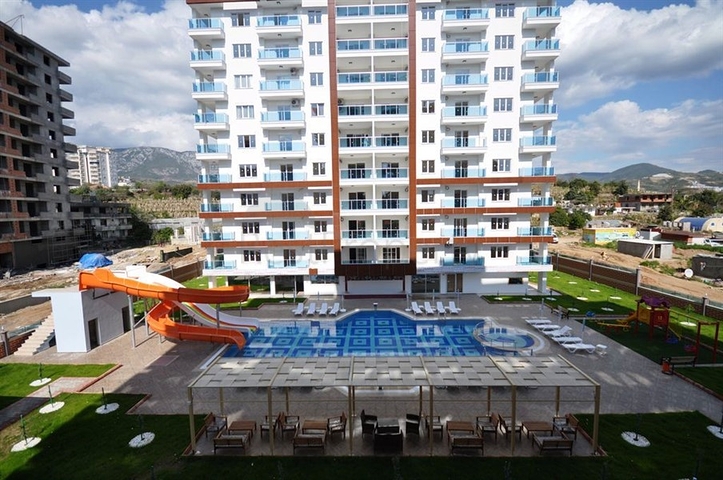 شقة ضمن مجمع سكني حديث في منطقة محمود لار – ألانيا