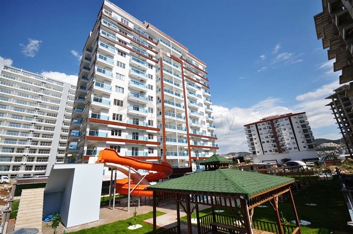 شقة ضمن مجمع سكني حديث في منطقة محمود لار – ألانيا