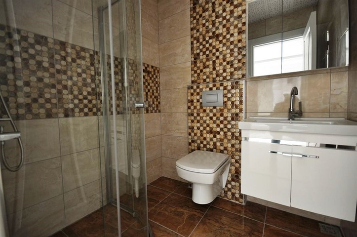 شقة ضمن مجمع سكني حديث في منطقة محمود لار – ألانيا