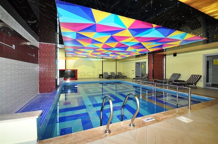 شقة ضمن مجمع سكني حديث في منطقة محمود لار – ألانيا